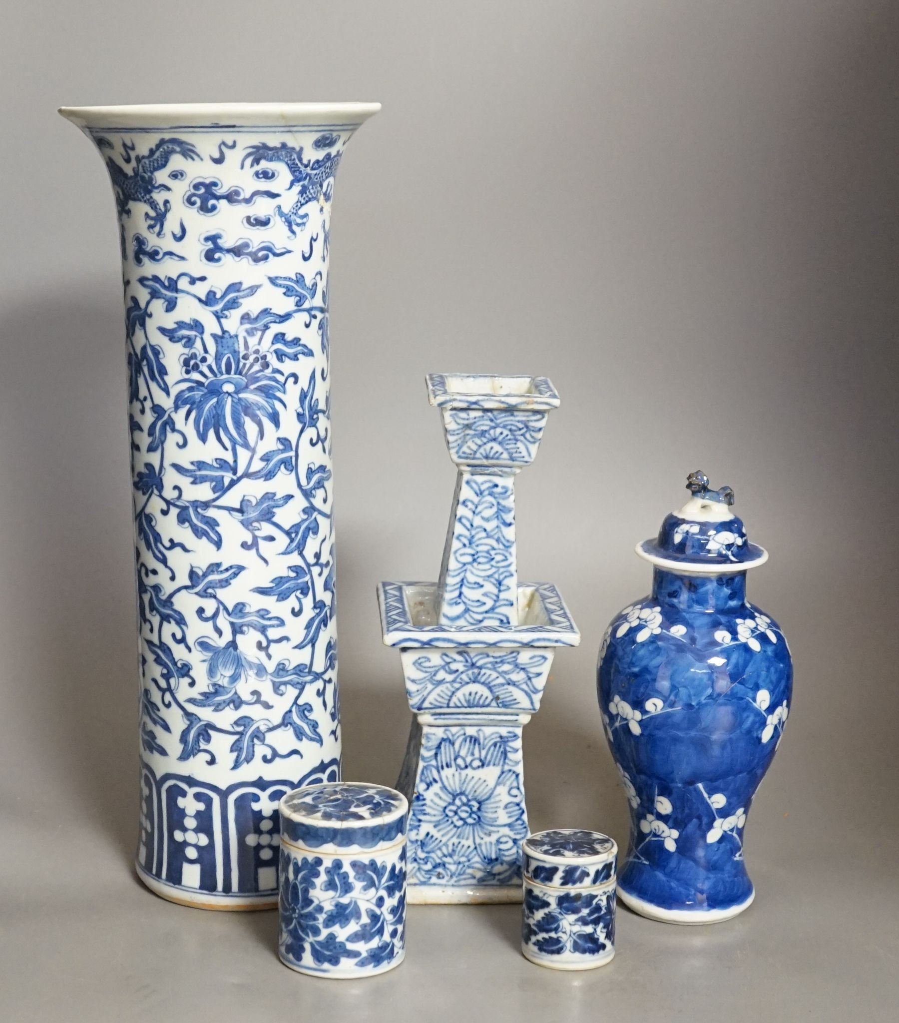 A group of 19th century Chinese blue and white vases, tallest 38.5cm, pots and a candlestick (5)